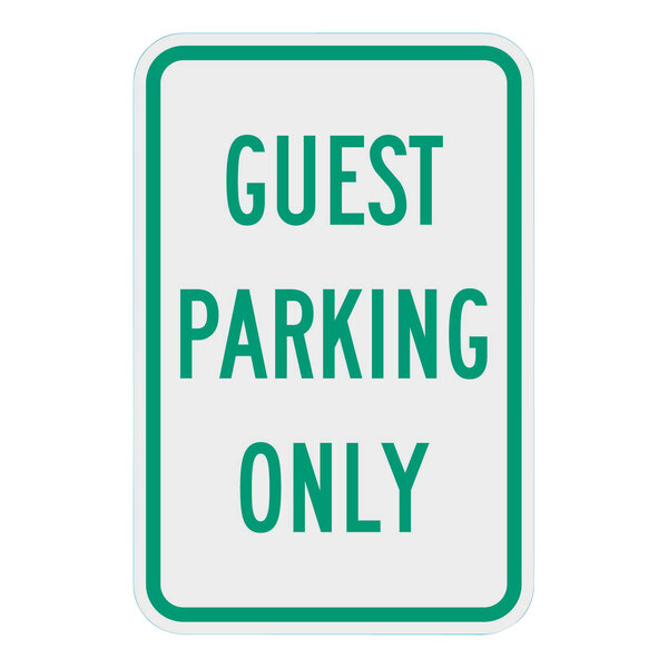 A white aluminum sign with a green border and green text that says "Guest Parking Only"
