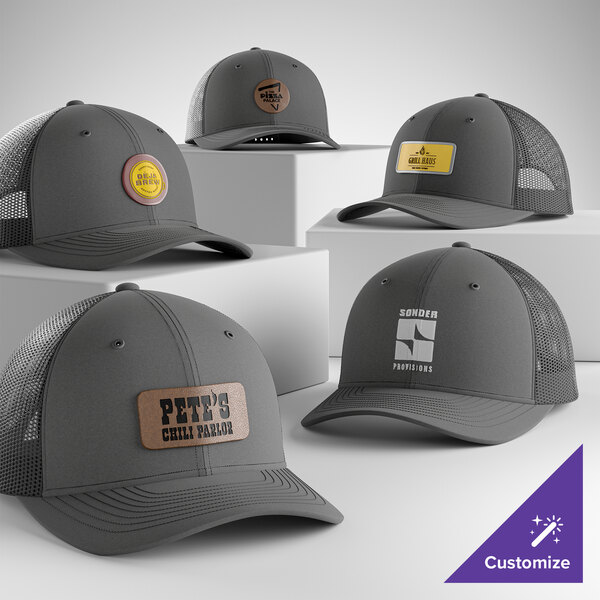 A customizable graphite 6-panel trucker cap with a mesh back and structured, mid-profile design.