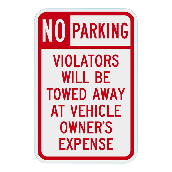 A white and red "No Parking / Violators Will Be Towed Away At Vehicle Owner's Expense" sign on aluminum.