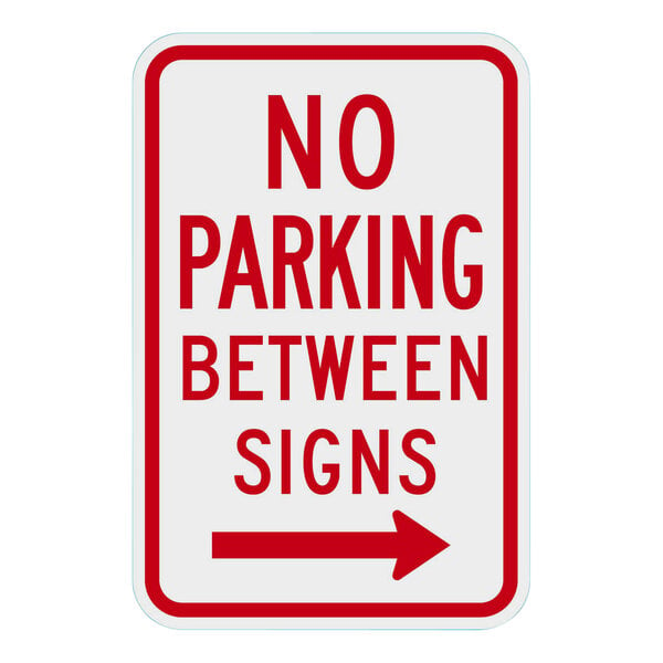 A white rectangular sign with red text that says "No Parking Between Signs" with a right arrow.