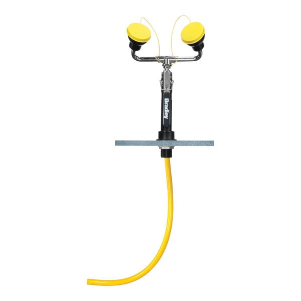 A yellow Bradley deck-mounted drench hose with black angled sprayheads.