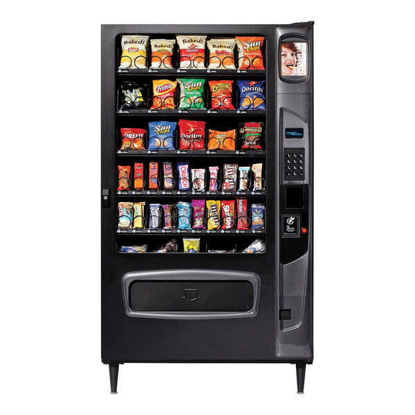 A Vending machine with snacks on shelves.