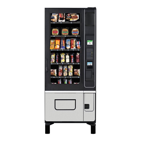 A Selectivend frozen food vending machine with a card reader and bill validator.