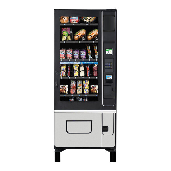 A Selectivend Evolution vending machine with food and drinks on shelves.