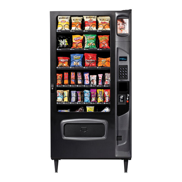 A Selectivend snack vending machine with snacks on shelves.