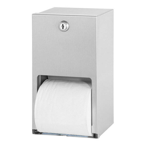 A stainless steel Bradley surface-mounted toilet tissue dispenser with a roll of toilet paper.