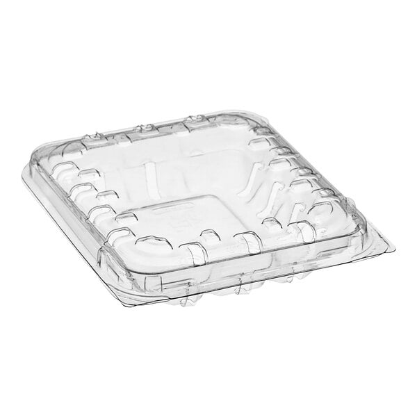 A D&W Fine Pack clear plastic produce container with vented slots.