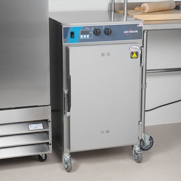 A stainless steel Alto-Shaam cook and hold oven with a door.