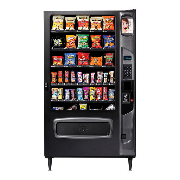 A Selectivend snack vending machine with snacks on shelves.