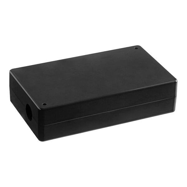 A black rectangular Estella Caffe control box with screws and a hole on top.