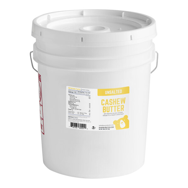A white bucket of Bare Unsalted Cashew Butter with a label.