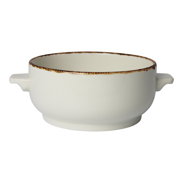 A white porcelain soup bowl with a brown dapple.