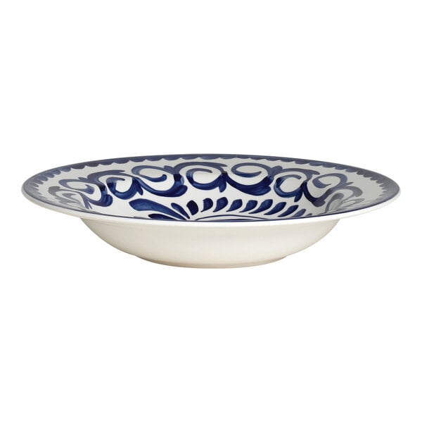 An Anfora porcelain bowl with blue and white designs.