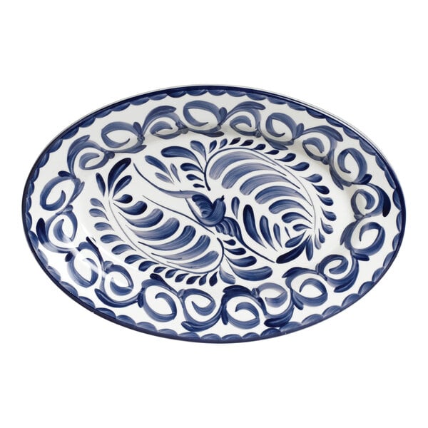 An Anfora Blue Puebla oval porcelain platter with a blue and white painted design.