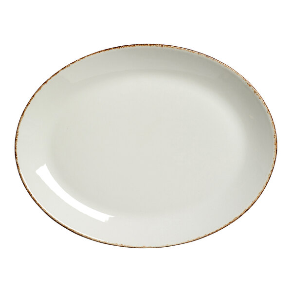 A white porcelain oval coupe platter with brown dappled rim.