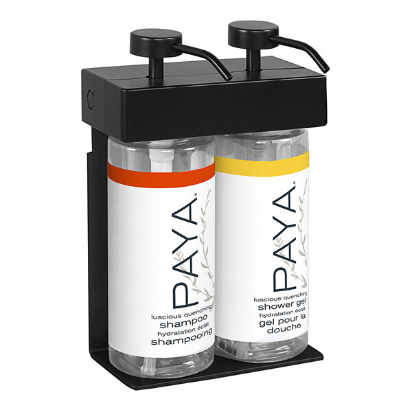 A black wall-mounted dispenser with two oval bottles of Paya shampoo inside.