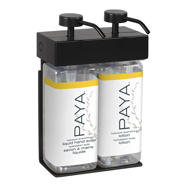 A black Dispenser Amenities wall-mounted shower dispenser with two rectangular bottles and black Paya labels.