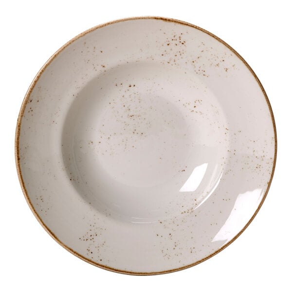 A Steelite white bowl with brown speckles on it.