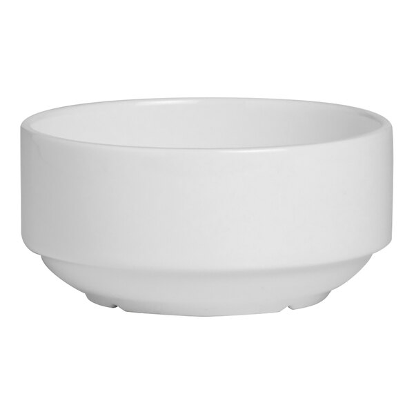 A white bowl with a handle.