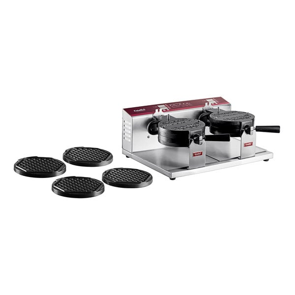A Estella double Belgian waffle maker with hexagon waffle plates on a counter in a professional kitchen.