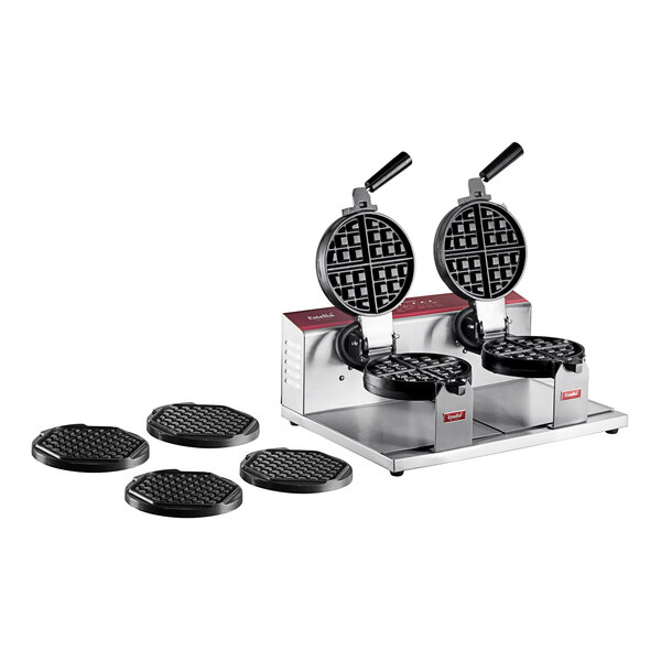 A Estella double Belgian waffle maker with hexagon waffle plates on a counter in a professional kitchen.