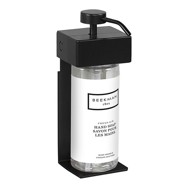 A black ABS plastic wall-mounted shower dispenser with a white label reading "Beekman" in black text.