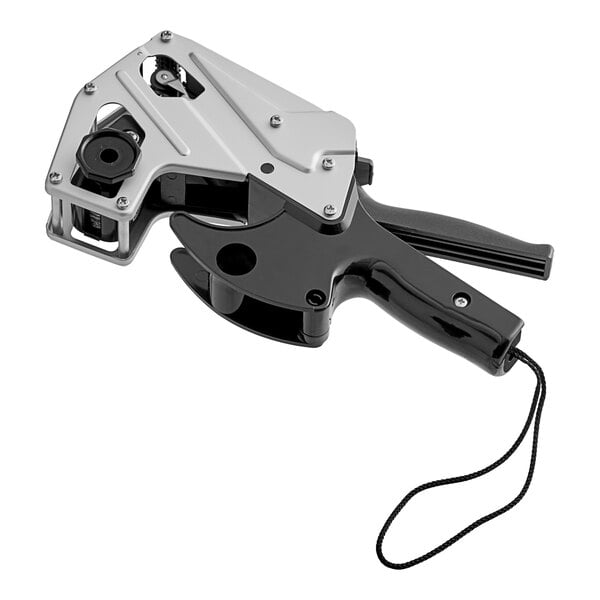 A black and silver metal DayMark date coder with band layout.