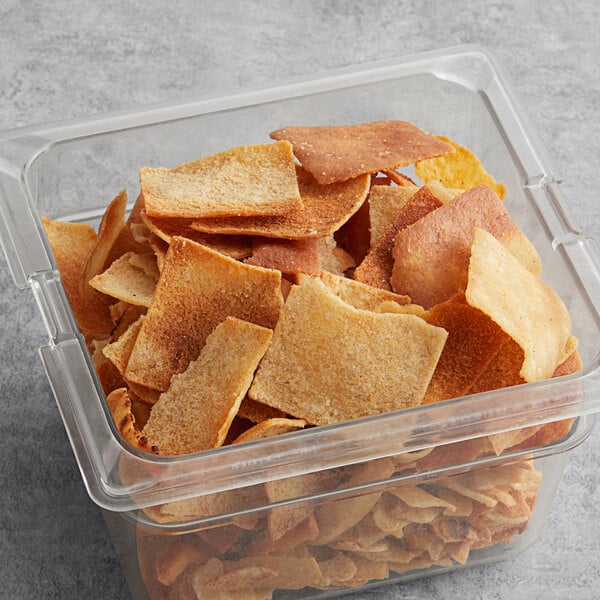 A plastic container of Issa's Classic Sea Salt Pita Chips with a lid on top.