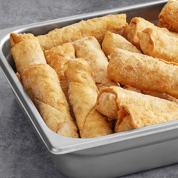A tray of fried Minh Pork and Vegetable Egg Rolls.