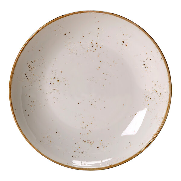 A white Steelite Performance Craft coupe bowl with brown specks on it.