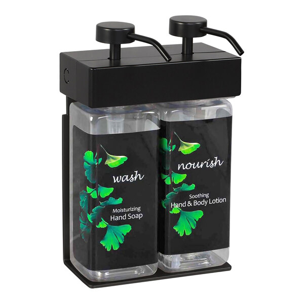 A black wall mounted dispenser with two rectangular bottles of Ginkgo labeled soap inside.