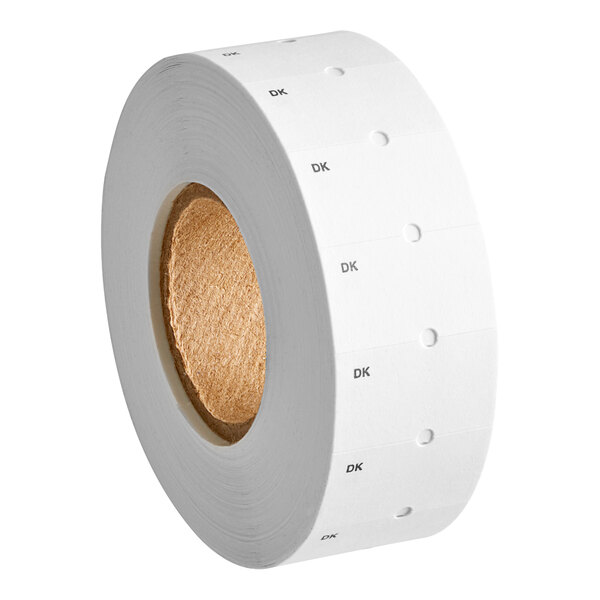 A roll of white DayMark date coder labels with black text on the edge.