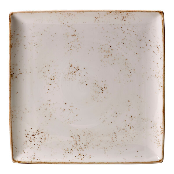 A Steelite Performance Craft white square tray with brown specks.