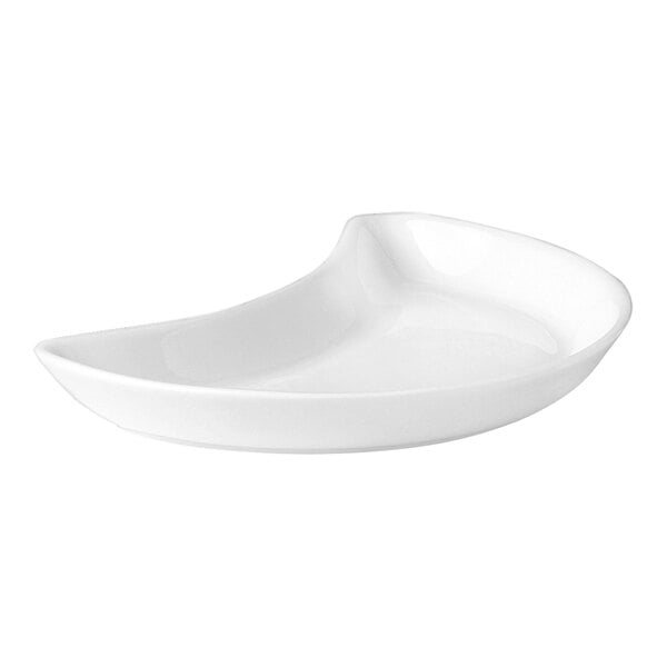 A white plate with a curved edge.