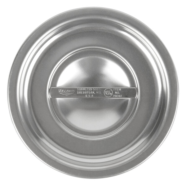 A close-up of a stainless steel Vollrath Bain Marie Cover.