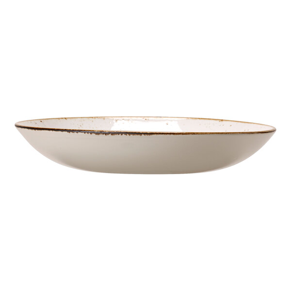 A Steelite Performance Craft white coupe bowl with brown specks.