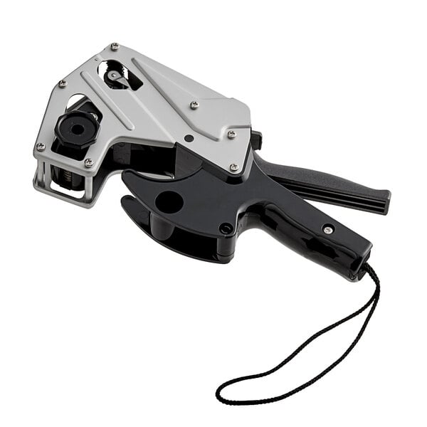 A black and silver metal DayMark labeler with a band layout.