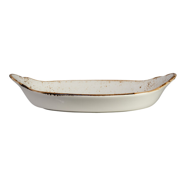 A white Steelite Performance Craft oval dish with brown accents.