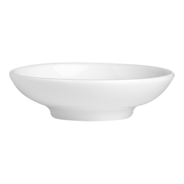 A close-up of a white Folio Parliament sauce dish with a rim.