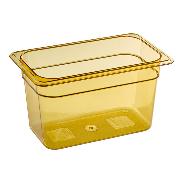 A Carlisle StorPlus amber plastic food pan with a lid.