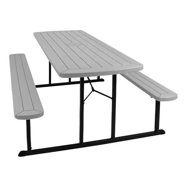 A National Public Seating light speckled grey picnic table with a black frame and benches.