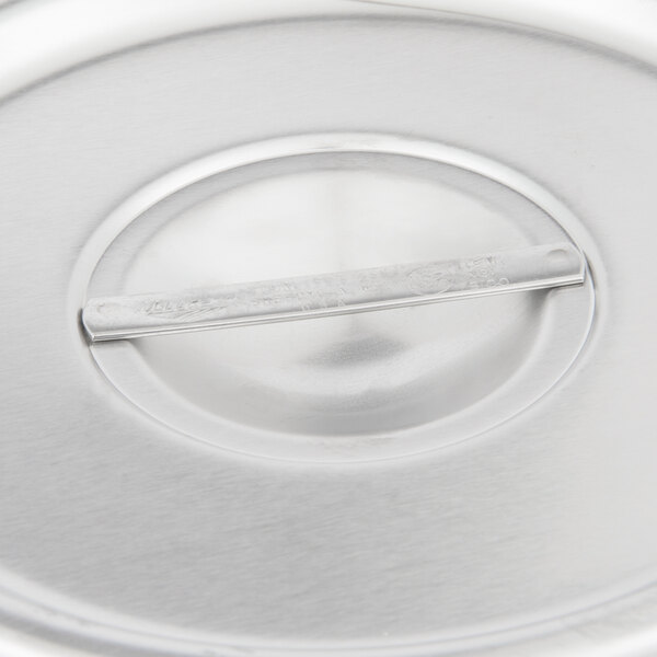 A close up of a Vollrath stainless steel Bain Marie cover.