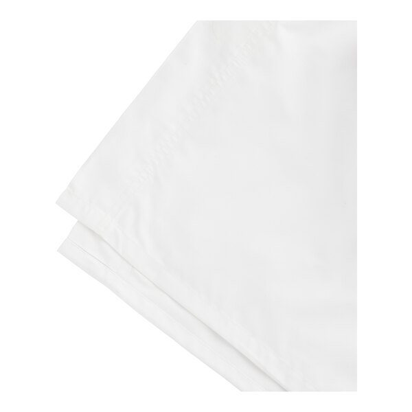 A folded white Oxford Superblend flat sheet.