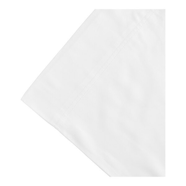 A close-up of a white cloth with a stitched edge.