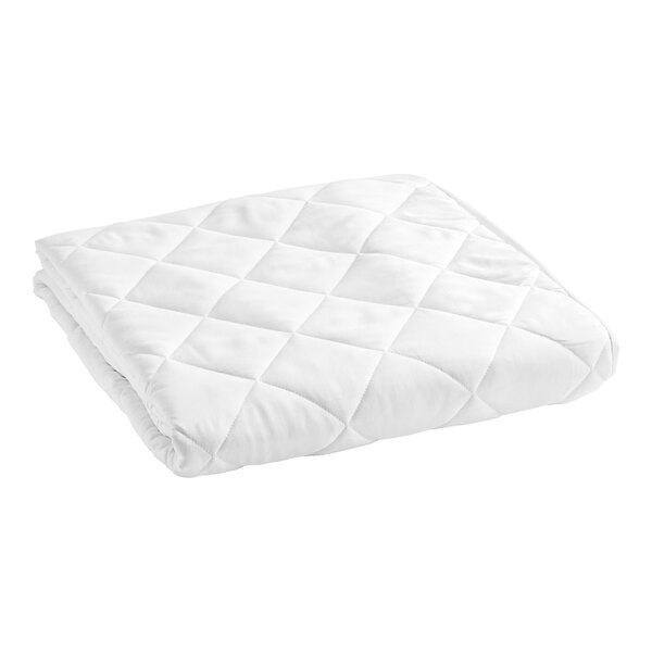 A white quilted mattress protector.