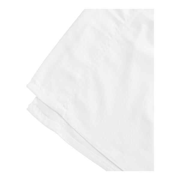 A folded Oxford Super Deluxe white flat sheet.