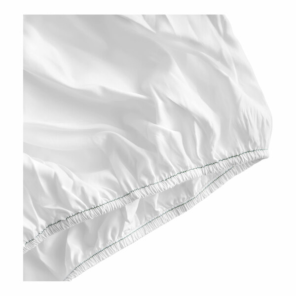 A white queen size fitted sheet made of 100% polyester microfiber with elastic edges.