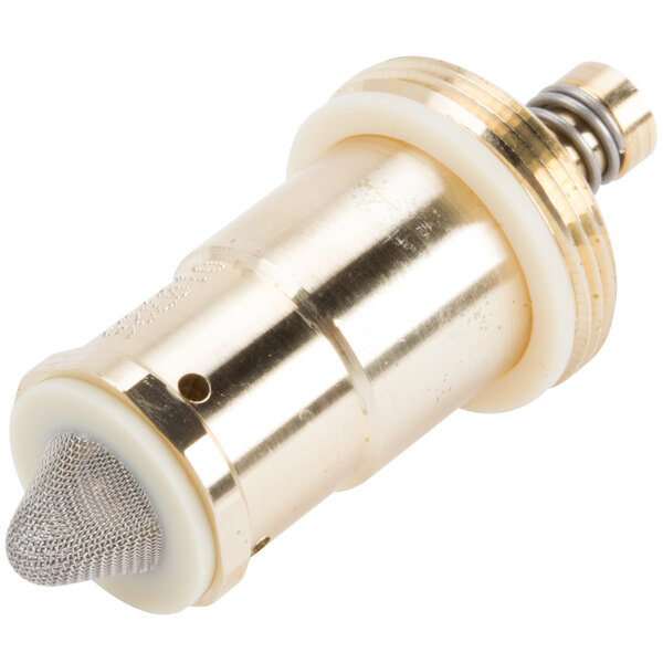 A close-up of a brass T&S metering barrel.