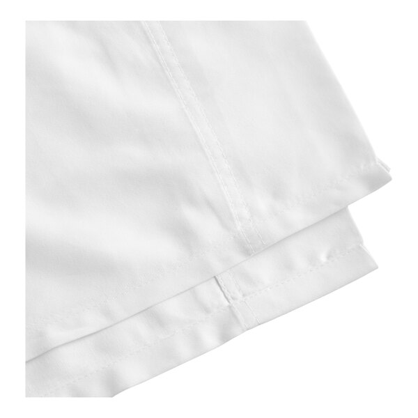 A white queen size 100% cotton flat sheet.