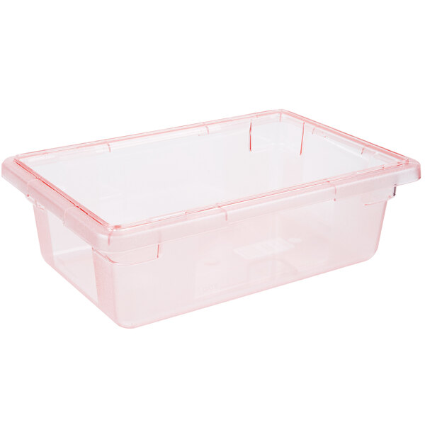 A Carlisle red plastic food storage box with a lid with a red trim.